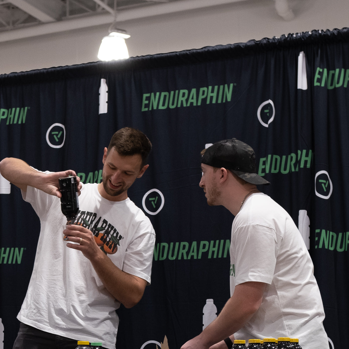 Enduraphin co-founders Danny Drake and Mike Dalberth demonstrating the product at an Enduraphin booth